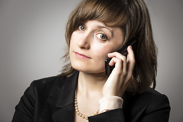 Image showing Business woman on mobile phone