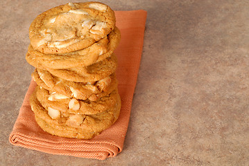 Image showing A stack of delicious white chocolate with macadamia nut cookies