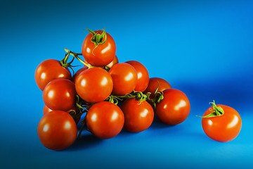 Image showing Tomatoes on blue