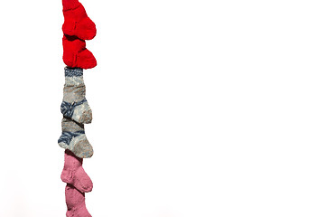 Image showing Three pairs of baby socks on white background