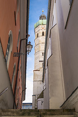 Image showing Narrow alley with view to a steeple