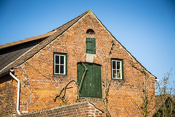 Image showing Front view red brick house