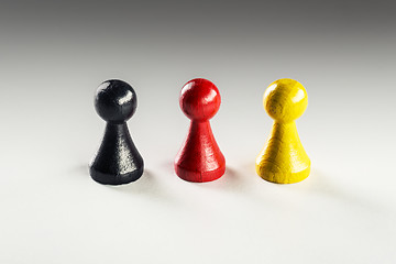 Image showing Black red yellow Ludo figure