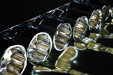 Image showing close up socket set on reflective surface
