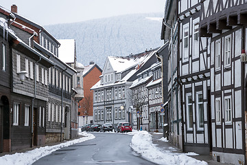 Image showing Street with half-timbered houses with snowfall