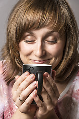 Image showing Woman enjoying tea