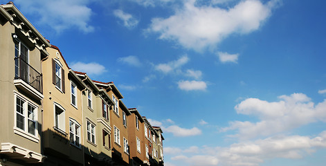 Image showing Modern houses and sky with clouds