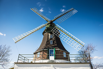 Image showing Closeup of windmill on the road