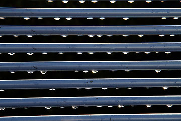 Image showing water drops and steel lines