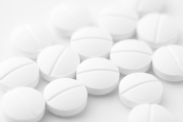 Image showing White pills on white background