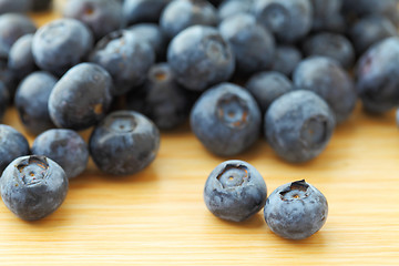 Image showing blueberry on wooden background 