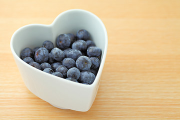 Image showing blueberry on heart shape bowl 