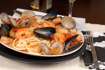 Image showing Seafood pasta made with bucatini pasta