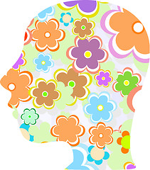 Image showing silhouette of a woman head filled with cute flowers