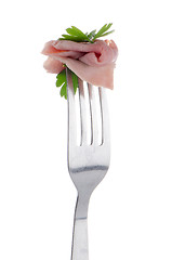 Image showing Slice of ham skewered on a fork 