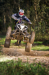 Image showing Quad rider jumping