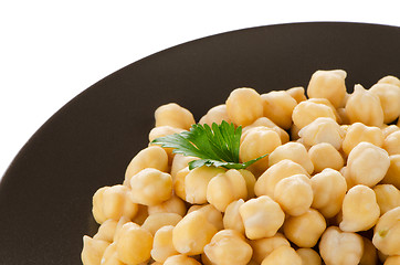 Image showing Chickpeas in a brown plate