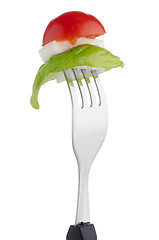 Image showing Caprese salad on the fork