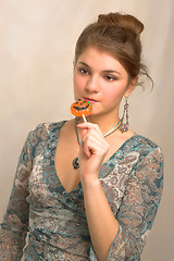 Image showing girl with candy