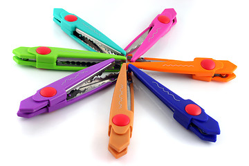 Image showing Brightly colors craft scissors on a white background