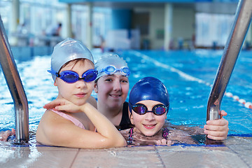 Image showing happy children group  at swimming pool