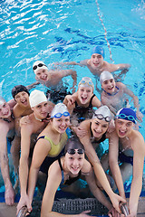 Image showing happy teen group  at swimming pool