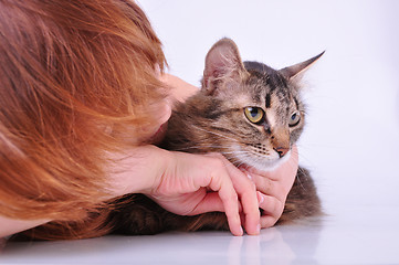 Image showing little girl communicating with her pet