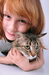 Image showing little girl communicating with her pet