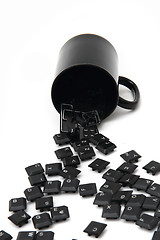 Image showing chaos black keyboard keys in the pot