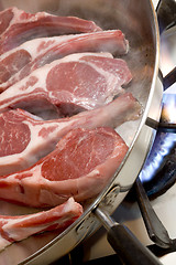 Image showing lamb chops steam rising