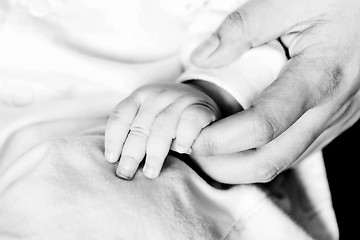 Image showing Baby holding hands