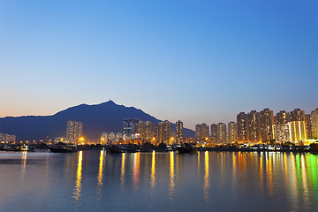 Image showing Sunset in Hong Kong downtown at coast