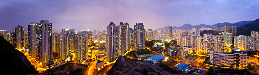 Image showing Hong Kong apartments at night, under the Lion Rock Hill.