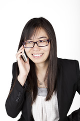 Image showing Asian business woman calling phone