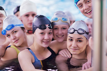 Image showing happy teen group  at swimming pool