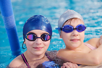 Image showing happy children group  at swimming pool