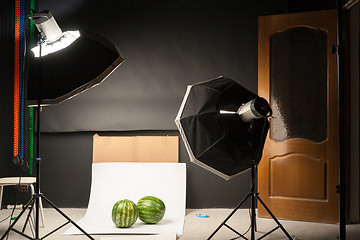 Image showing water-melon in a photographic studio on a white background