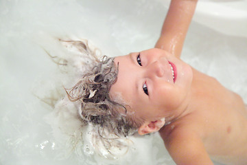 Image showing Girl washing hair