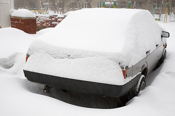 Image showing Snow covered car