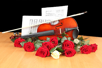 Image showing red and white roses