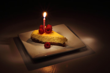 Image showing cheesecake in the dark night 