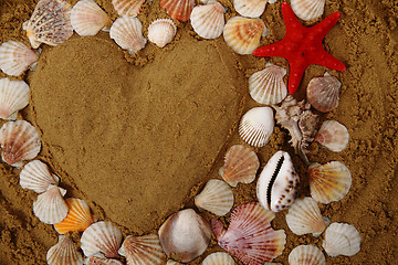 Image showing heart from the sand and shells 