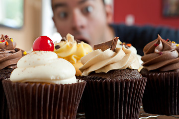 Image showing Man Wants to Eat Cupcakes