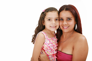 Image showing Young latin mother hugging her daughter isolated on a white back