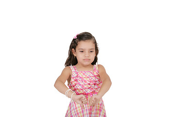Image showing portrait of a beautiful little girl with thumb down isolated on 