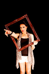 Image showing Woman holding frame.