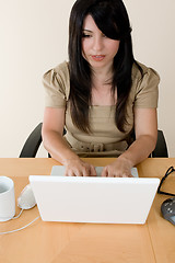 Image showing Woman typing on a laptop