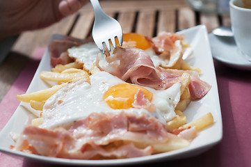 Image showing Breakfast with bacon and eggs