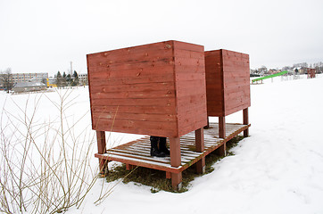 Image showing beach dressing cabin snow woman legs shoes winter 