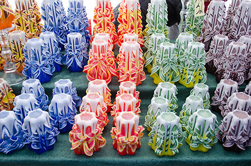 Image showing colorful decor wax candle sell outdoor market fair 